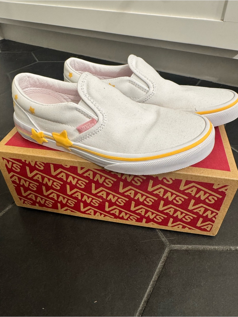 Vans Kids White Slip-On Sneakers with Yellow Star Accents